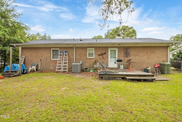 6424 Bretton Woods Dr, Hope Mills, NC 28348 - rear view of house featuring a deck, brick siding, and central AC unit