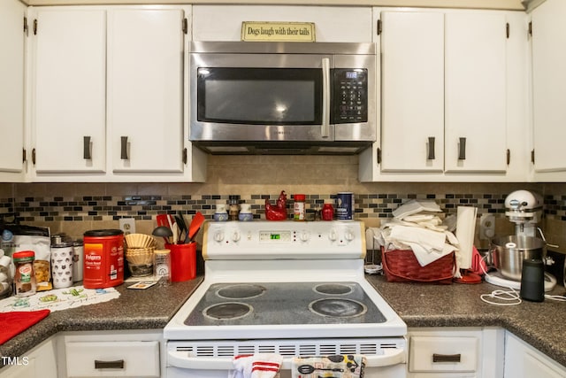 6424 Bretton Woods Dr, Hope Mills, NC 28348 - kitchen featuring stainless steel microwave, white electric range oven, and white cabinetry