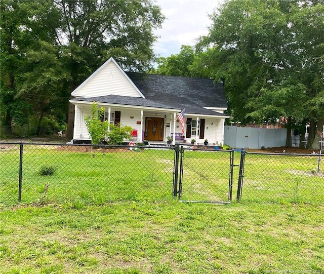 135 S Patterson S, Maxton, NC 28364 - view of front of property with a porch and a gate