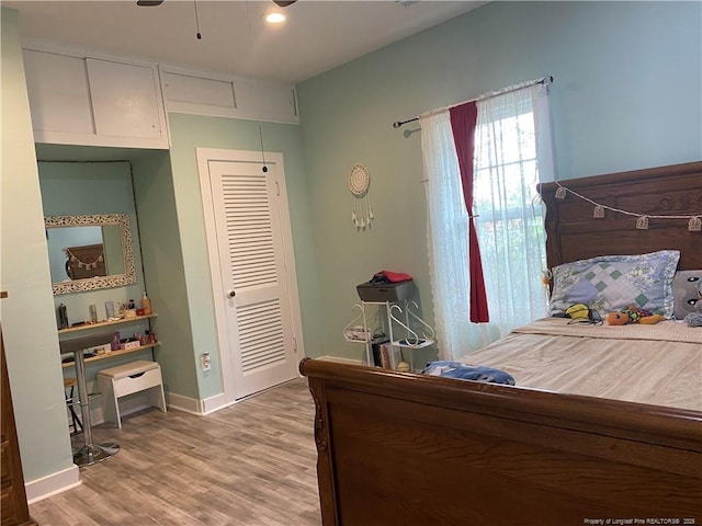 135 S Patterson S, Maxton, NC 28364 - bedroom featuring light wood finished floors and baseboards