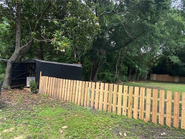 135 S Patterson S, Maxton, NC 28364 - view of yard with an outdoor structure