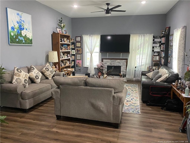 135 S Patterson S, Maxton, NC 28364 - living area with ceiling fan, dark wood-type flooring, a fireplace, and recessed lighting