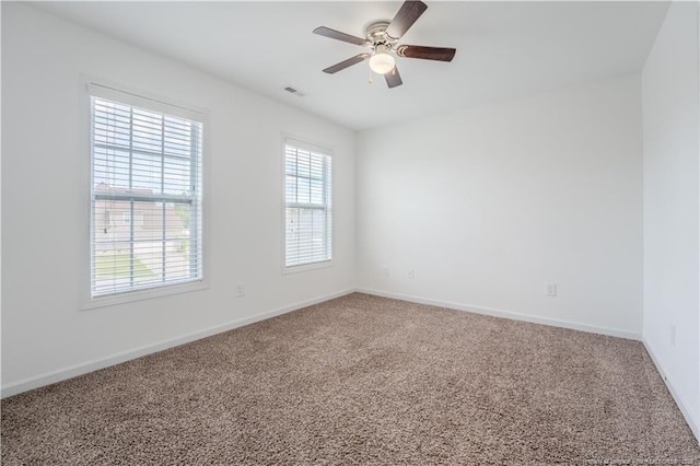 2912 Seafarer Dr, Fayetteville, NC 28306 - unfurnished room featuring carpet, baseboards, and ceiling fan