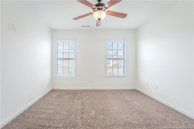 2912 Seafarer Dr, Fayetteville, NC 28306 - unfurnished room with light carpet, baseboards, and a ceiling fan