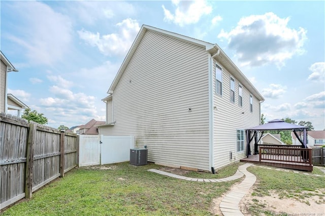 2912 Seafarer Dr, Fayetteville, NC 28306 - view of side of home with a gazebo, a deck, and central AC