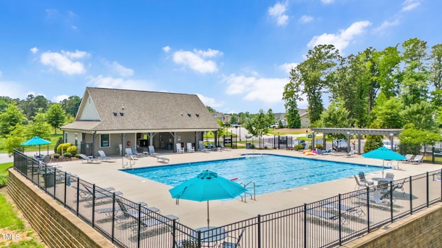 31 Pascoli Ct, Clayton, NC 27527 - community pool featuring a patio area