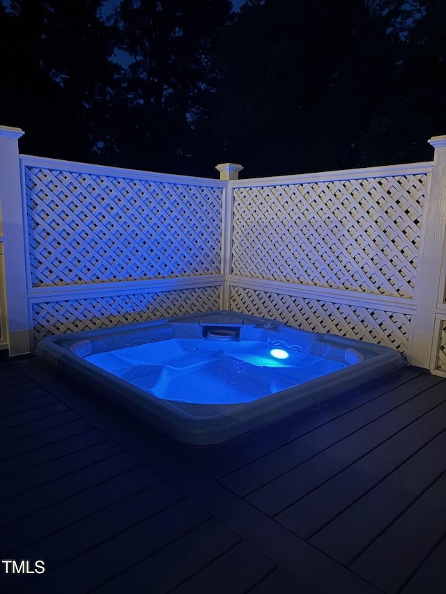 6553 Vintage Ridge Ln, Fuquay Varina, NC 27526 - wooden deck featuring an outdoor hot tub