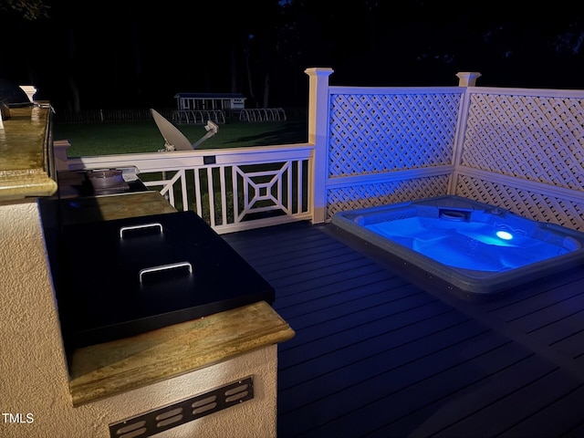 6553 Vintage Ridge Ln, Fuquay Varina, NC 27526 - deck at twilight featuring an outdoor hot tub