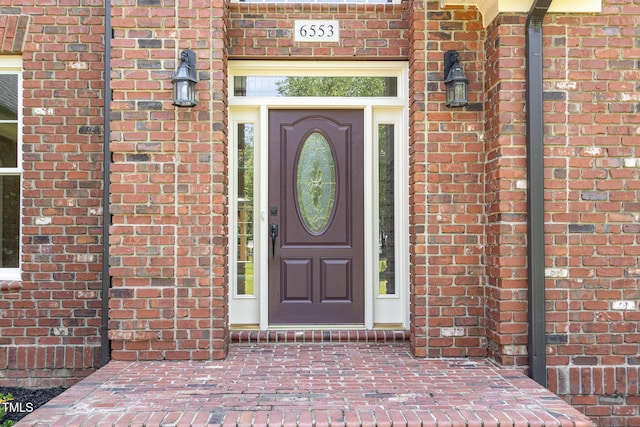 6553 Vintage Ridge Ln, Fuquay Varina, NC 27526 - property entrance with brick siding