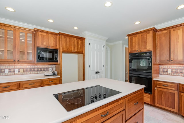 6553 Vintage Ridge Ln, Fuquay Varina, NC 27526 - kitchen featuring black appliances, recessed lighting, light countertops, tasteful backsplash, and brown cabinets