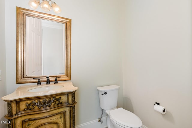 6553 Vintage Ridge Ln, Fuquay Varina, NC 27526 - half bathroom featuring baseboards, toilet, and vanity