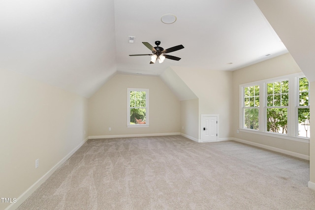 6553 Vintage Ridge Ln, Fuquay Varina, NC 27526 - additional living space with carpet, ceiling fan, baseboards, and lofted ceiling