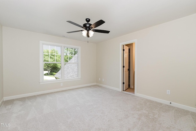6553 Vintage Ridge Ln, Fuquay Varina, NC 27526 - spare room with carpet floors, ceiling fan, and baseboards