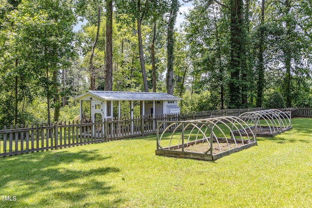 6553 Vintage Ridge Ln, Fuquay Varina, NC 27526 - view of yard featuring a garden and an outbuilding