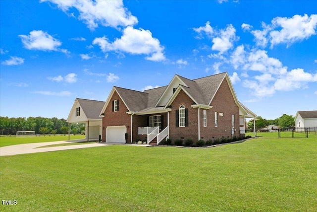 103 Kayla Marie Ln, Goldsboro, NC 27530 - view of front of property with driveway, brick siding, a garage, and crawl space