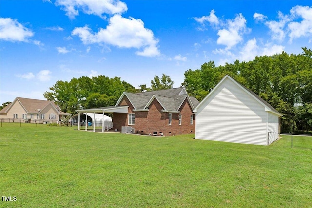 103 Kayla Marie Ln, Goldsboro, NC 27530 - rear view of property with central AC and brick siding