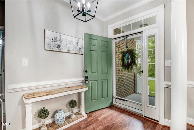 103 Kayla Marie Ln, Goldsboro, NC 27530 - foyer entrance featuring ornamental molding, a chandelier, and wood finished floors
