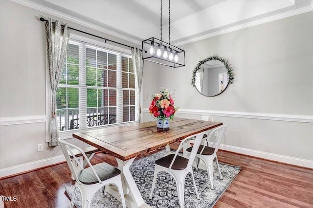 103 Kayla Marie Ln, Goldsboro, NC 27530 - dining room featuring wood finished floors, ornamental molding, baseboards, and a chandelier