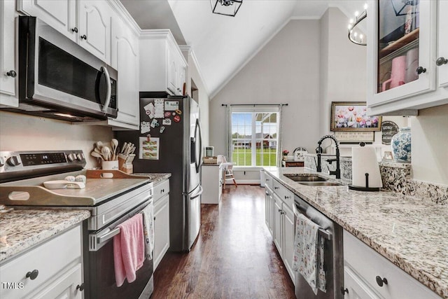 103 Kayla Marie Ln, Goldsboro, NC 27530 - kitchen featuring stainless steel appliances, a sink, white cabinets, dark wood-style floors, and glass insert cabinets