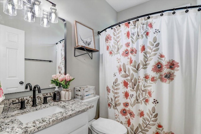 103 Kayla Marie Ln, Goldsboro, NC 27530 - bathroom featuring vanity, toilet, and a shower with shower curtain