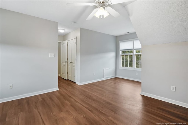 4420 Battle Forest Rd, Hope Mills, NC 28348 - empty room with ceiling fan, baseboards, and wood finished floors