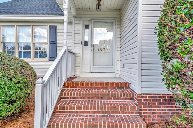 1502 E 11th St, Lumberton, NC 28358 - property entrance featuring a shingled roof