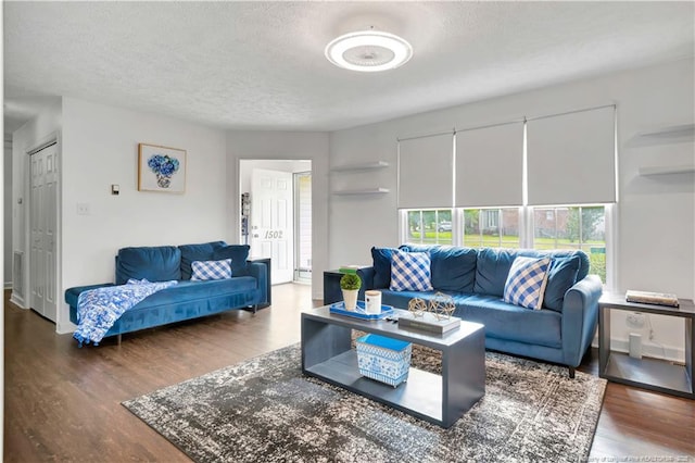 1502 E 11th St, Lumberton, NC 28358 - living area featuring wood finished floors and a textured ceiling
