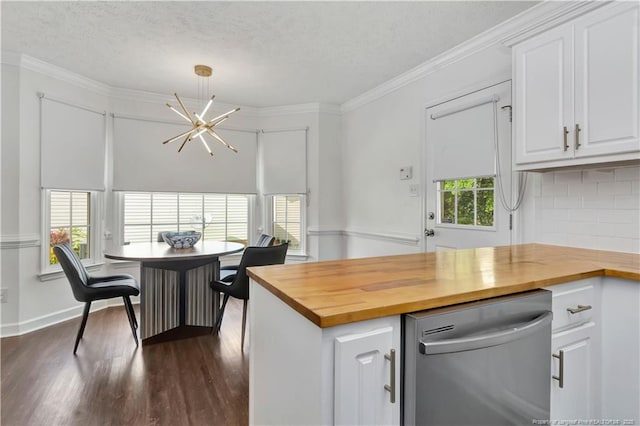 1502 E 11th St, Lumberton, NC 28358 - kitchen featuring stainless steel dishwasher, butcher block countertops, a chandelier, dark wood-type flooring, and crown molding