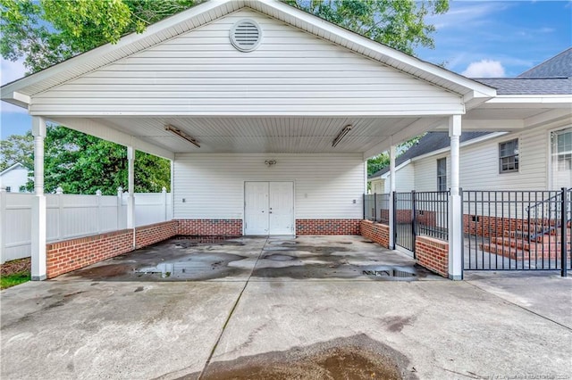 1502 E 11th St, Lumberton, NC 28358 - view of parking / parking lot with concrete driveway and an attached carport