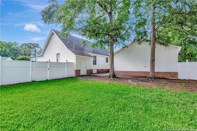 1502 E 11th St, Lumberton, NC 28358 - rear view of property with a gate