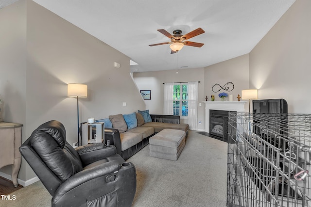 120 Feezor Ct, Clayton, NC 27527 - carpeted living room with a ceiling fan and a fireplace with flush hearth