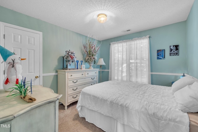 120 Feezor Ct, Clayton, NC 27527 - bedroom with a textured ceiling and light colored carpet