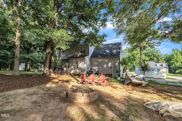 120 Feezor Ct, Clayton, NC 27527 - rear view of house featuring a fire pit