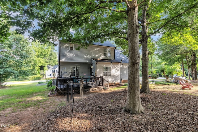 120 Feezor Ct, Clayton, NC 27527 - back of property with a wooden deck