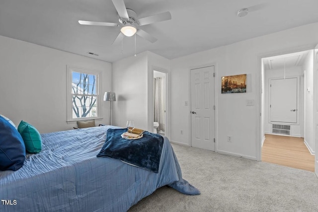 1536 Maybrook Dr, Raleigh, NC 27610 - carpeted bedroom featuring attic access, baseboards, ensuite bath, and ceiling fan