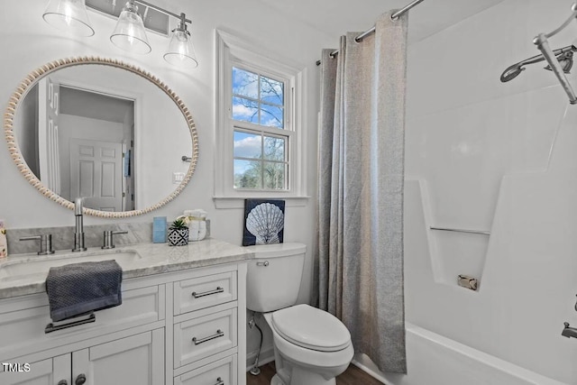 1536 Maybrook Dr, Raleigh, NC 27610 - bathroom with vanity, toilet, and shower / bath combo with shower curtain