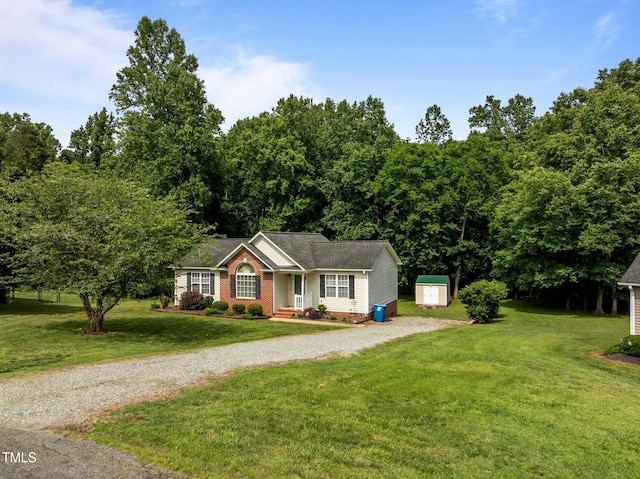 1383 Deercroft Ct, Graham, NC 27253 - ranch-style home with driveway and a front yard