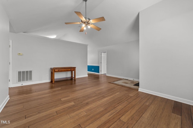 1383 Deercroft Ct, Graham, NC 27253 - unfurnished living room with ceiling fan, lofted ceiling, wood finished floors, and baseboards