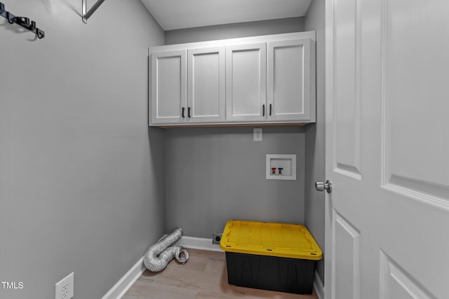1383 Deercroft Ct, Graham, NC 27253 - laundry area featuring cabinet space, hookup for an electric dryer, baseboards, and washer hookup