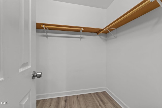 1383 Deercroft Ct, Graham, NC 27253 - spacious closet with wood finished floors