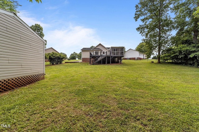 1383 Deercroft Ct, Graham, NC 27253 - view of green lawn featuring stairway and a wooden deck
