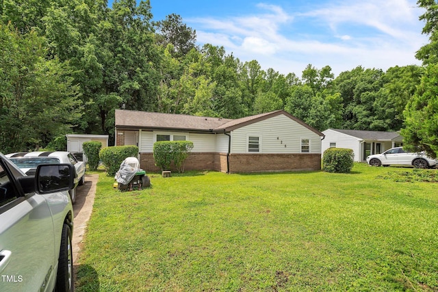 428 Walton St, Durham, NC 27703 - view of front of house with brick siding and a front yard