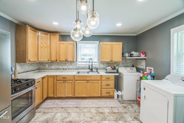 428 Walton St, Durham, NC 27703 - kitchen with a sink, washer and clothes dryer, appliances with stainless steel finishes, light countertops, and crown molding