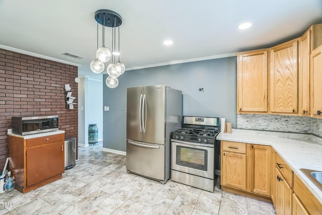 428 Walton St, Durham, NC 27703 - kitchen with stainless steel appliances, ornamental molding, hanging light fixtures, a sink, and decorative backsplash