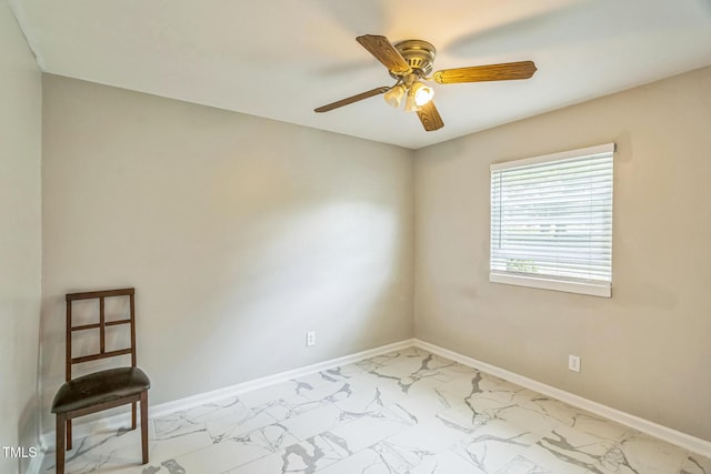 428 Walton St, Durham, NC 27703 - unfurnished room with marble look tiles, a ceiling fan, and baseboards