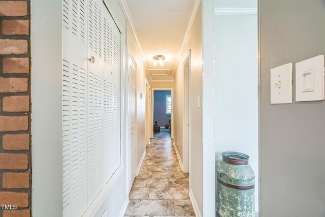 428 Walton St, Durham, NC 27703 - hall with baseboards, stone finish floors, and crown molding