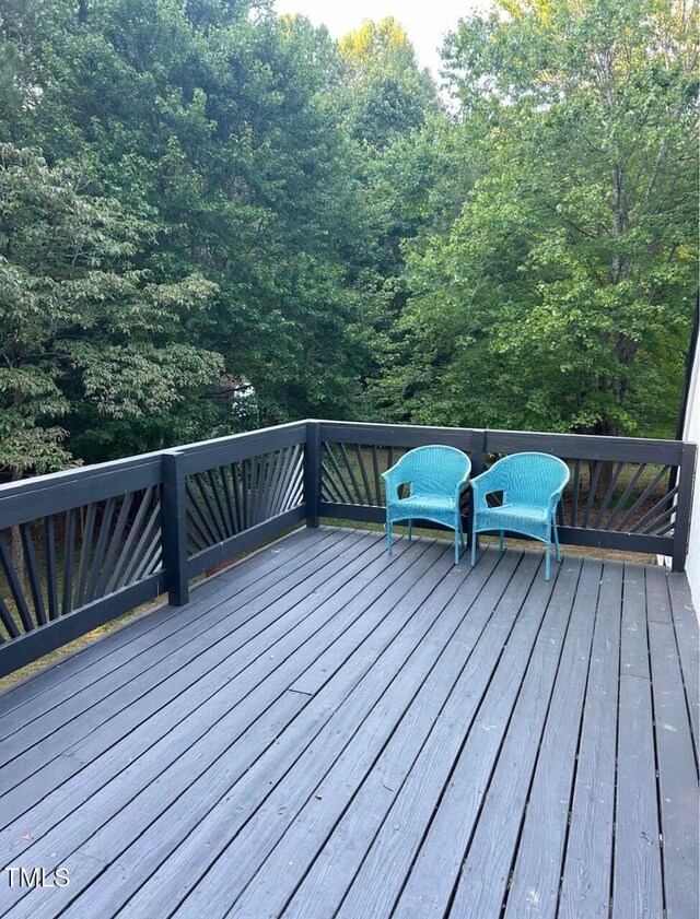 300 Christmas Rd, Warrenton, NC 27589 - deck featuring a forest view