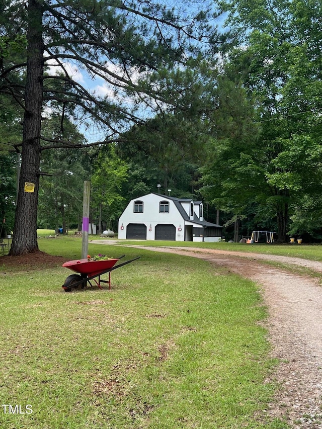 300 Christmas Rd, Warrenton, NC 27589 - view of community featuring driveway, a lawn, and view of scattered trees