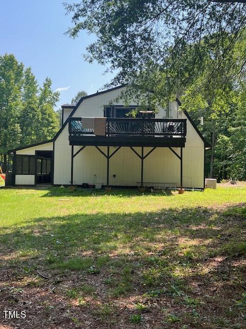 300 Christmas Rd, Warrenton, NC 27589 - back of house featuring a yard