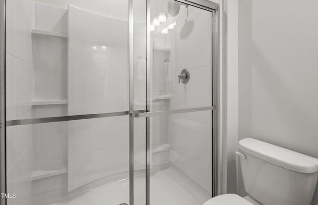 1525 Tamarisk Ln, Durham, NC 27703 - full bathroom with toilet and a shower stall
